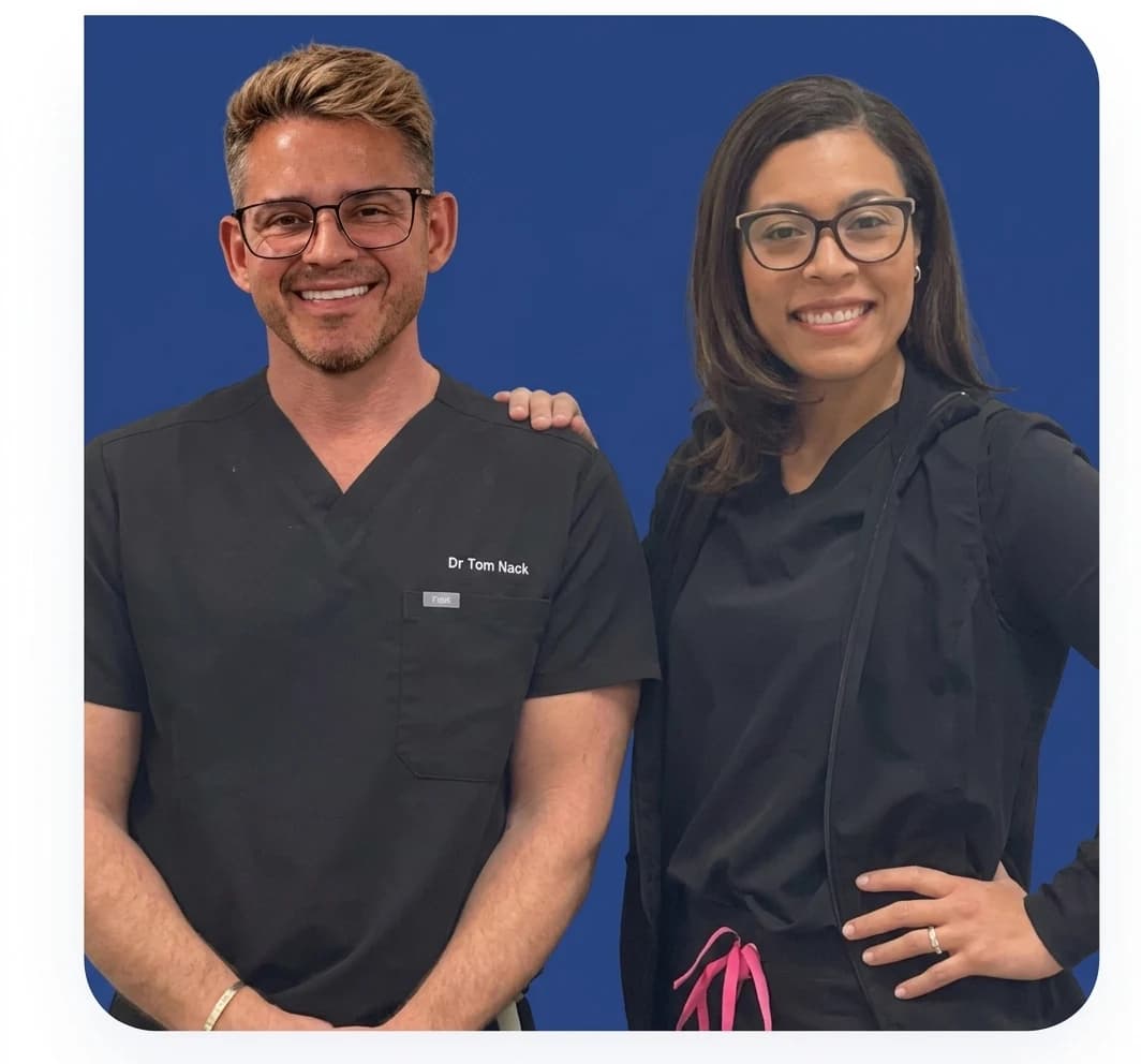 Dr. Tom Nack and Tenchi smiling at Mountain View Smiles dental office in Scottsdale, AZ