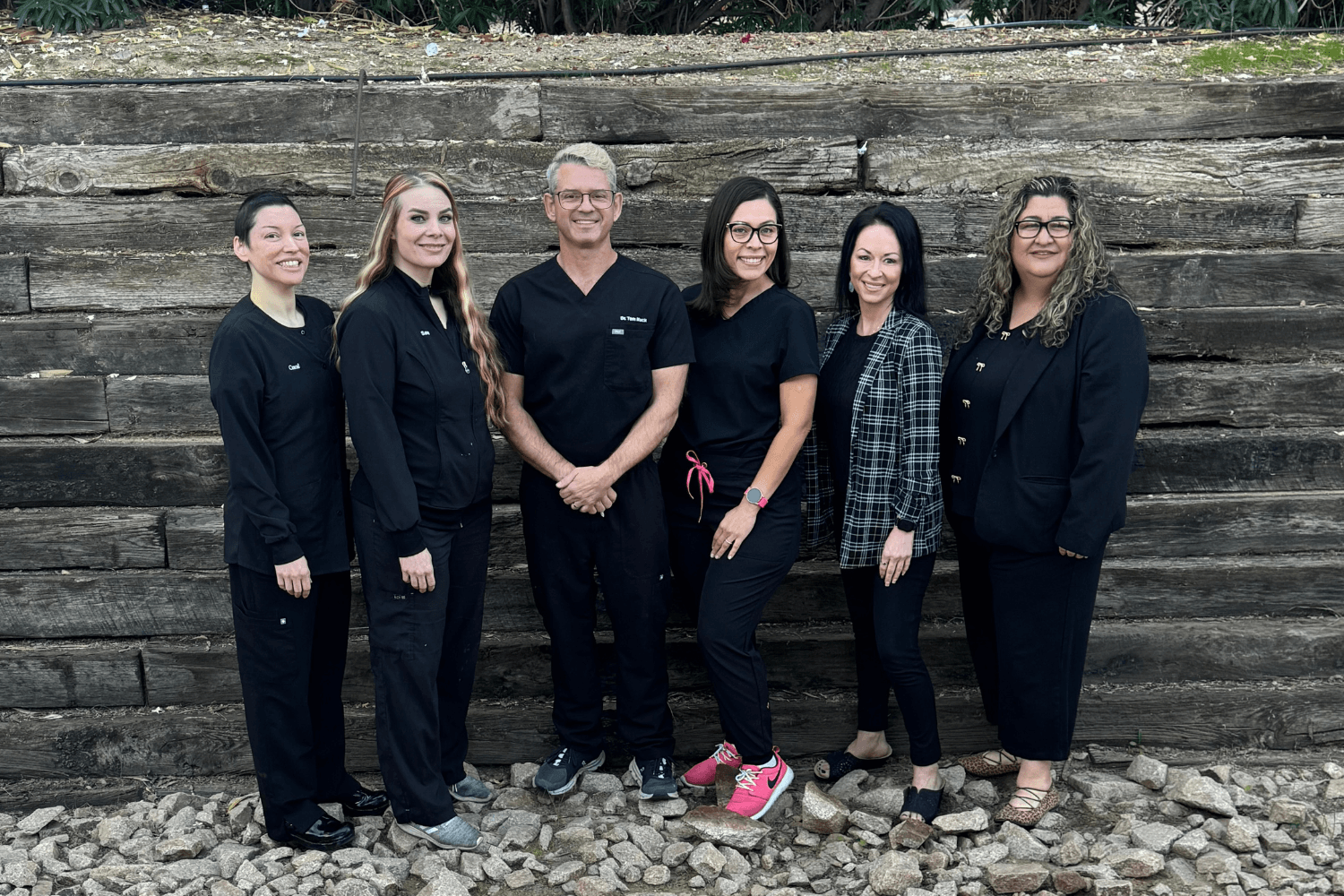 The Mountain View Smiles dental team standing together outdoors